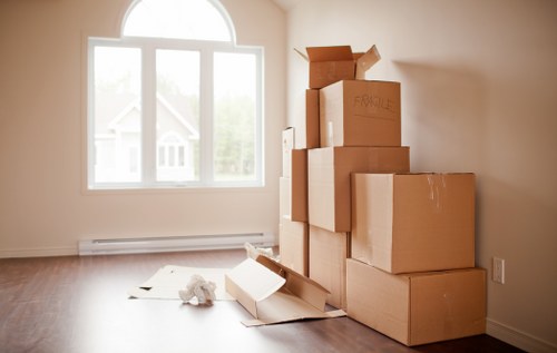 Furniture reassembly and office setup during a West Brompton business move