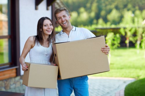 Packed boxes and furniture prepared for a West Brompton house move