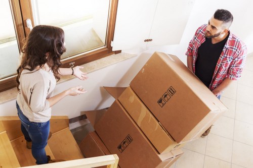 Commercial removals van transporting office items in West Brompton