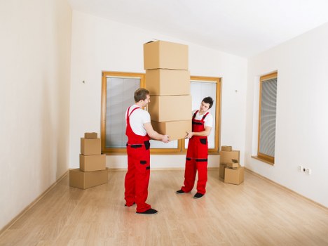 Packed household belongings prepared for removal in West Brompton