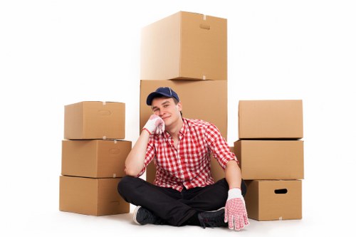 Removal van loading household items for a West Brompton move